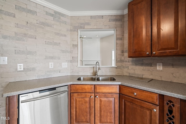 kitchen with a sink, ornamental molding, light countertops, and dishwasher