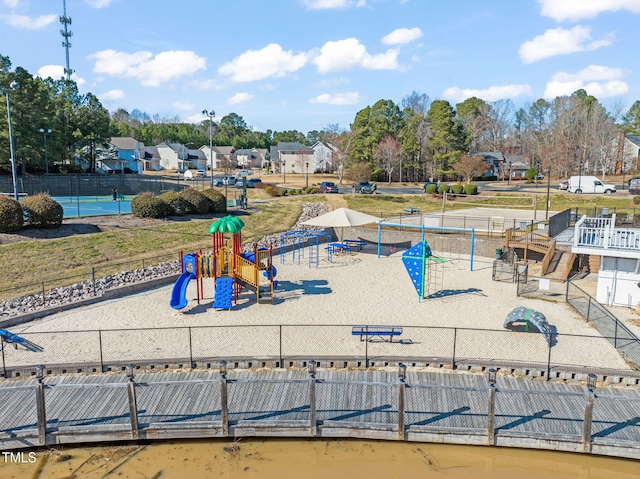 community jungle gym with fence