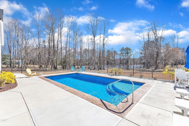 view of pool featuring a patio area, fence, and a fenced in pool