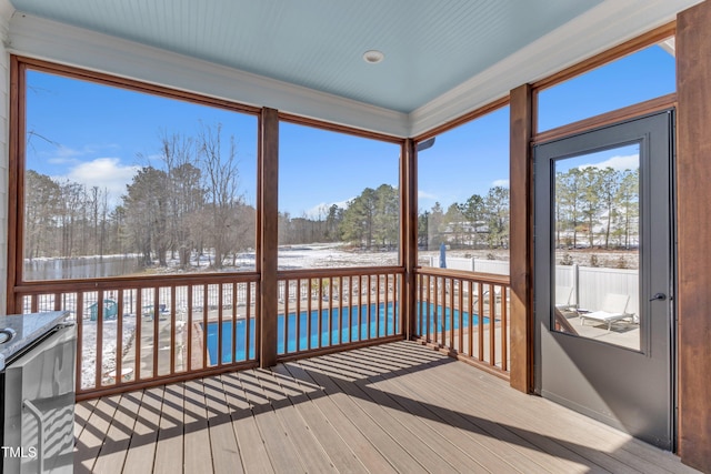 unfurnished sunroom with a wealth of natural light