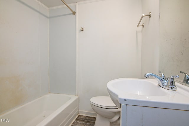 full bathroom with vanity, hardwood / wood-style floors, tub / shower combination, and toilet