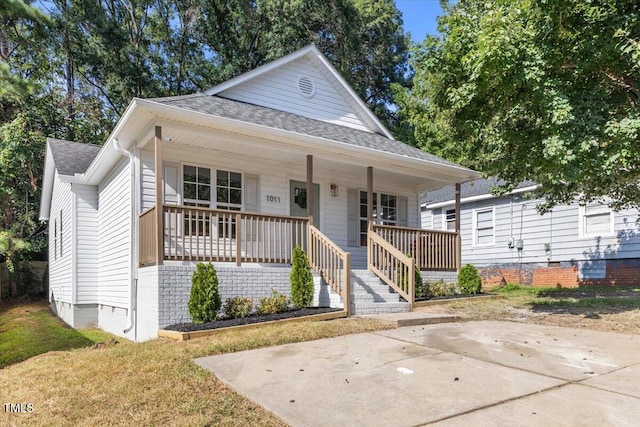 bungalow-style home featuring covered porch