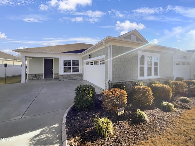 single story home featuring a garage