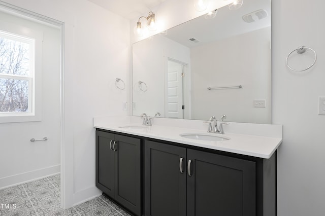 bathroom featuring vanity and tile patterned flooring