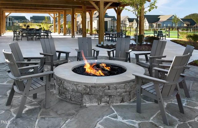 view of patio / terrace with an outdoor fire pit