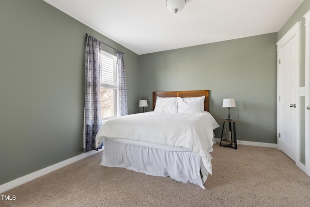 bedroom with light carpet