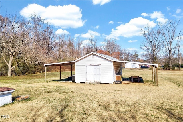 view of shed with a carport