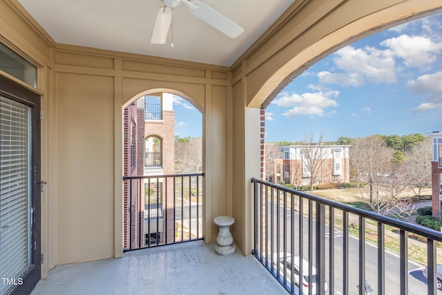 balcony featuring a ceiling fan