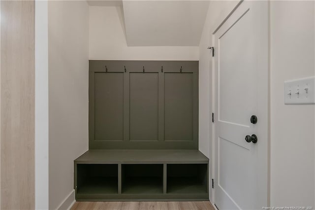 mudroom with light hardwood / wood-style floors