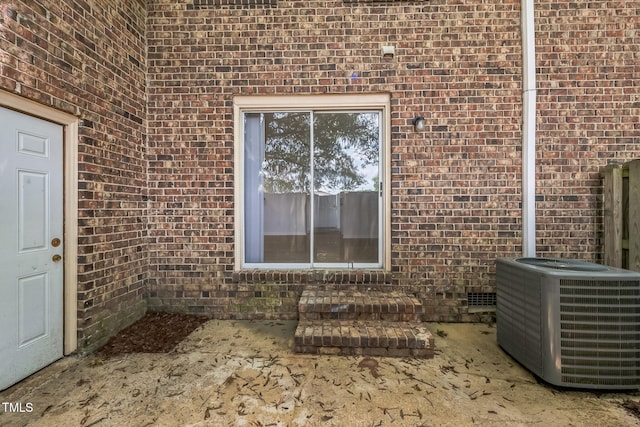 408 Cumbrian Ct, Fayetteville, NC 28314 - entrance to property featuring central air condition unit and brick siding