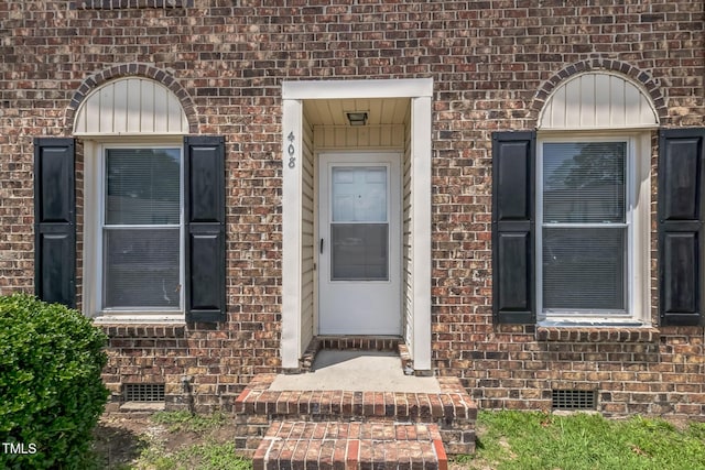 408 Cumbrian Ct, Fayetteville, NC 28314 - view of exterior entry featuring brick siding and crawl space