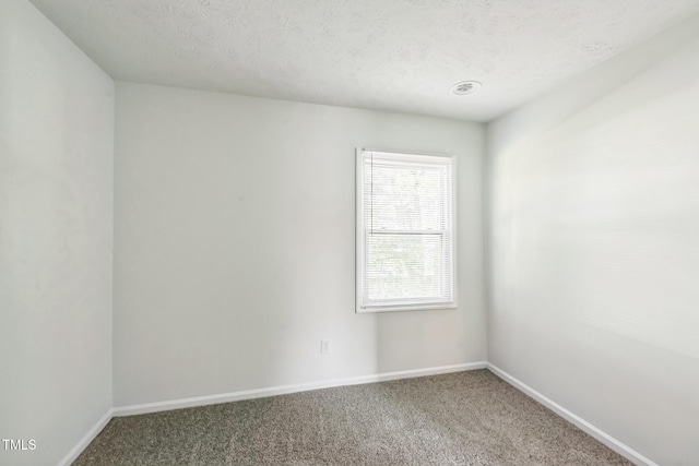408 Cumbrian Ct, Fayetteville, NC 28314 - unfurnished room with carpet flooring, baseboards, and a textured ceiling
