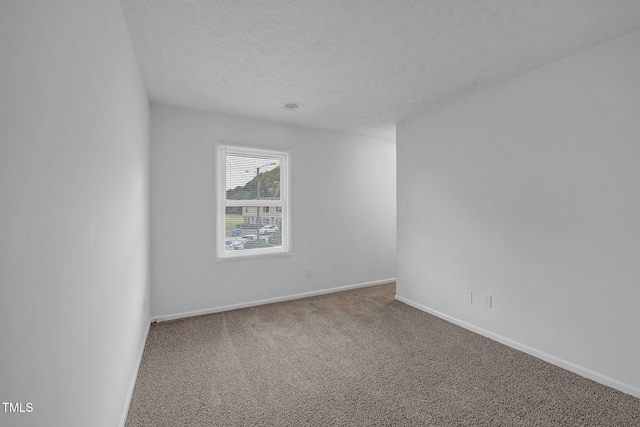 408 Cumbrian Ct, Fayetteville, NC 28314 - carpeted spare room featuring baseboards and a textured ceiling