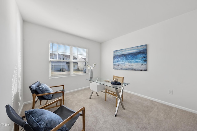 home office with baseboards and carpet flooring