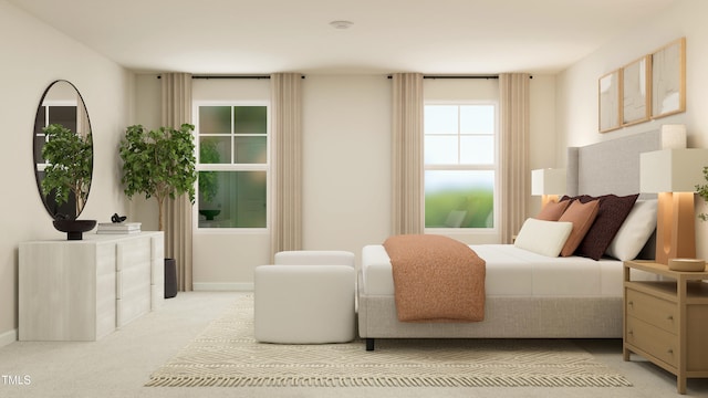 bedroom featuring light colored carpet