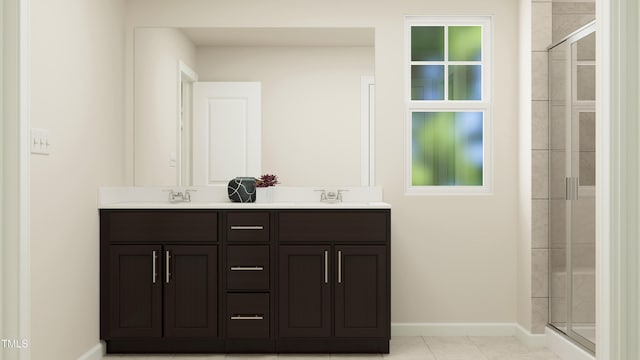 bathroom featuring vanity, tile patterned flooring, and walk in shower