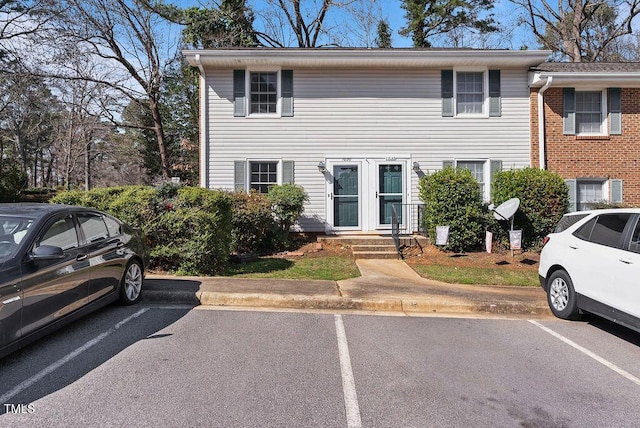 view of front of property with uncovered parking