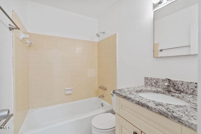 full bath featuring tub / shower combination, vanity, and toilet