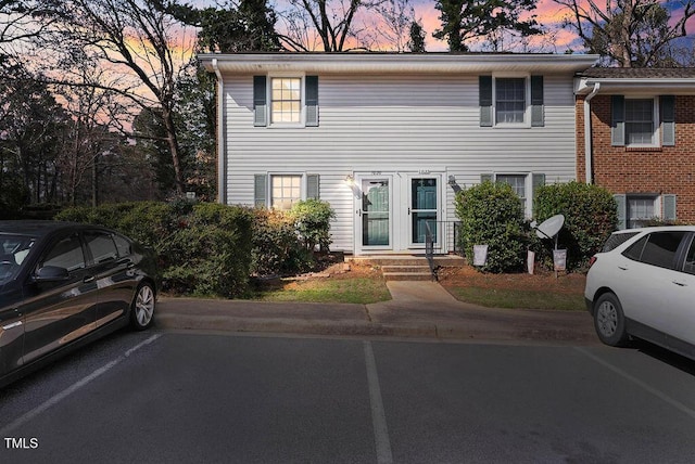 view of front of house featuring uncovered parking