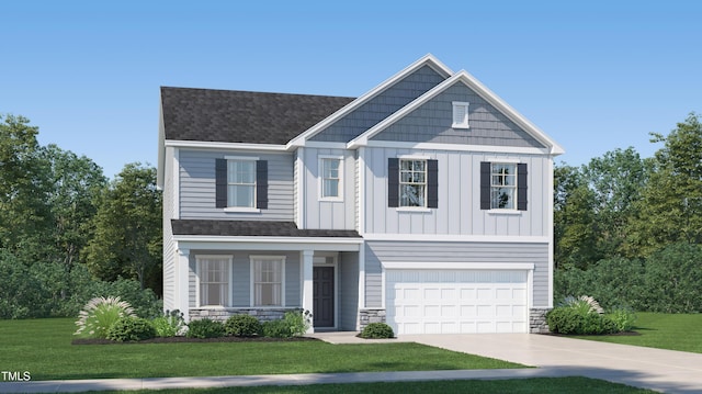 craftsman-style home featuring a garage and a front yard