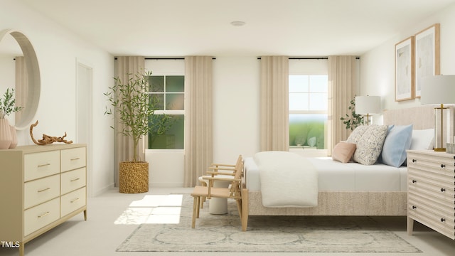 bedroom with light colored carpet