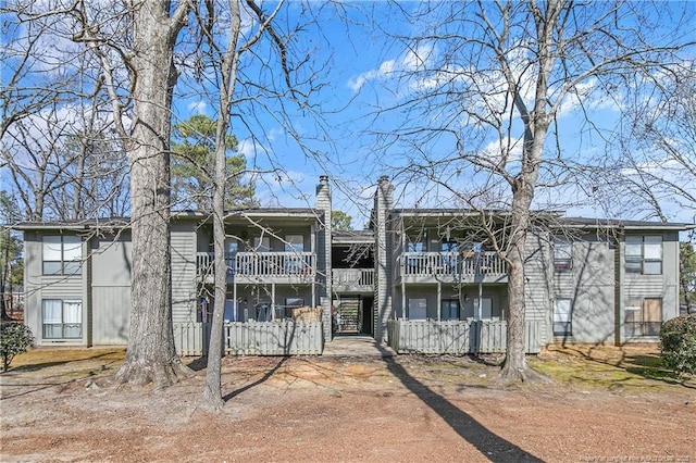 view of front of home with a balcony