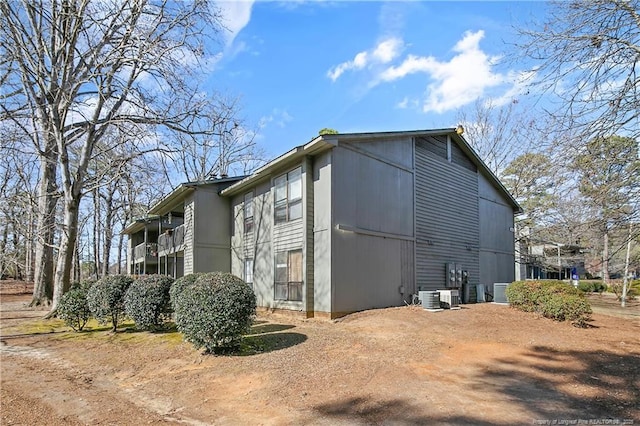 view of property exterior featuring central AC unit