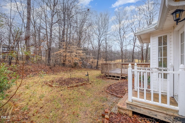 view of yard with a deck