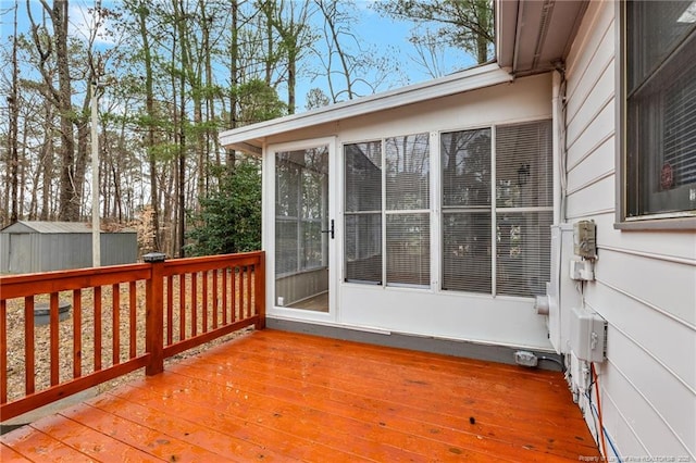 deck featuring a storage shed