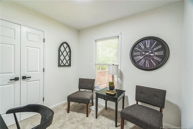 5802 Lillie Dr, Durham, NC 27712 - living area with light carpet and baseboards