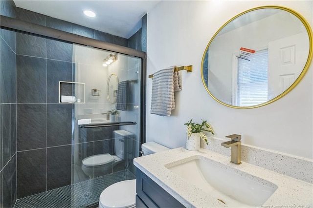5802 Lillie Dr, Durham, NC 27712 - bathroom with toilet, a shower stall, and vanity