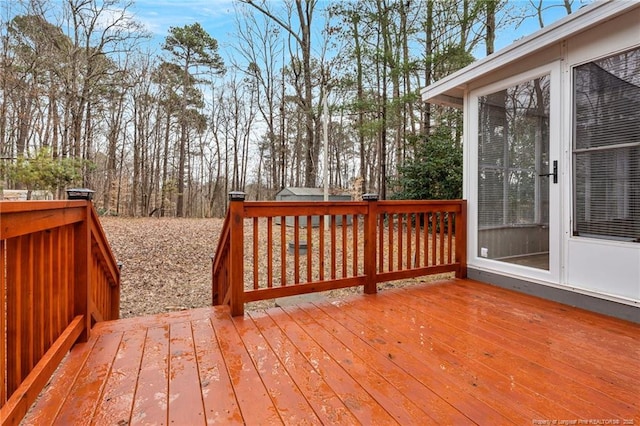 5802 Lillie Dr, Durham, NC 27712 - wooden terrace featuring view of wooded area