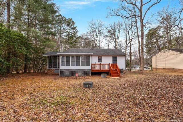 5802 Lillie Dr, Durham, NC 27712 - rear view of property featuring a sunroom and a deck