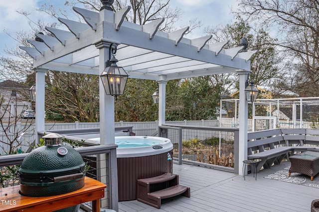 wooden terrace featuring area for grilling, fence, a pergola, and a hot tub