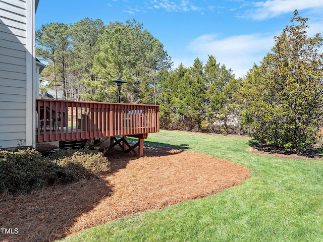 view of yard with a deck