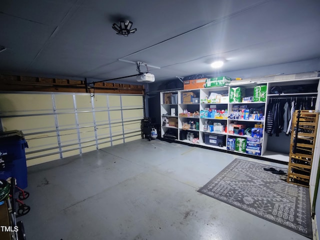 garage featuring a garage door opener