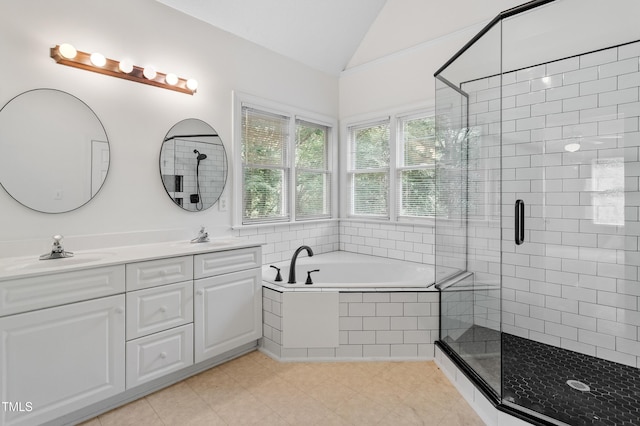 725 Littleleaf Ct, Holly Springs, NC 27540 - bathroom featuring lofted ceiling, a shower stall, a garden tub, double vanity, and tile patterned flooring