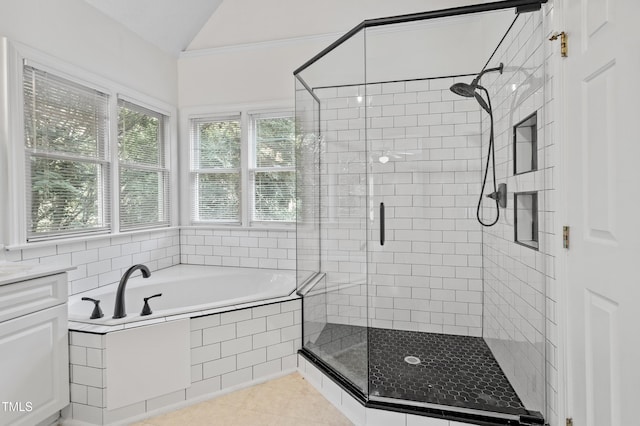 725 Littleleaf Ct, Holly Springs, NC 27540 - full bathroom featuring a shower stall, a garden tub, vanity, tile patterned flooring, and vaulted ceiling