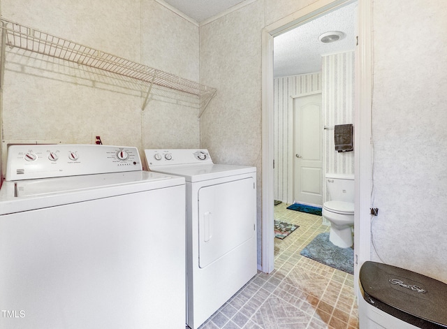 laundry room featuring separate washer and dryer