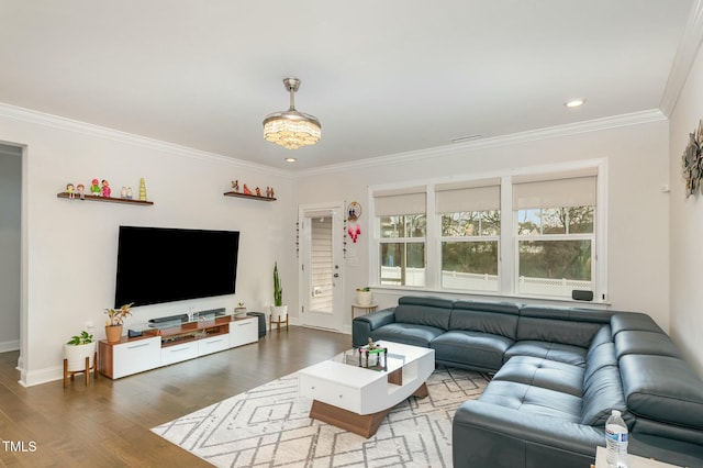 living room featuring hardwood / wood-style floors and ornamental molding