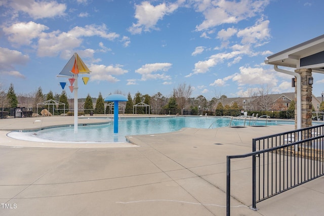 view of swimming pool with a gazebo and a patio