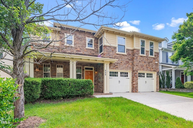 532 Front Ridge Dr, Cary, NC 27519 - view of front of house with a garage, concrete driveway, stone siding, and a front lawn