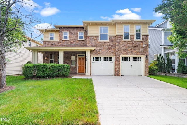 532 Front Ridge Dr, Cary, NC 27519 - view of front facade with driveway, stone siding, a garage, and a front yard