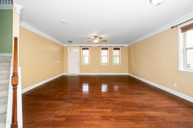 532 Front Ridge Dr, Cary, NC 27519 - spare room featuring healthy amount of natural light, ceiling fan, baseboards, and ornamental molding