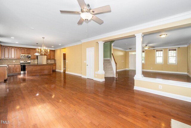 532 Front Ridge Dr, Cary, NC 27519 - unfurnished living room with a ceiling fan, ornate columns, ornamental molding, dark wood-style floors, and baseboards