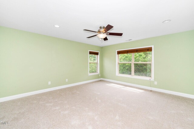 532 Front Ridge Dr, Cary, NC 27519 - spare room with light carpet, baseboards, a ceiling fan, and recessed lighting