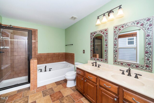 532 Front Ridge Dr, Cary, NC 27519 - bathroom with a bath, a stall shower, double vanity, and toilet