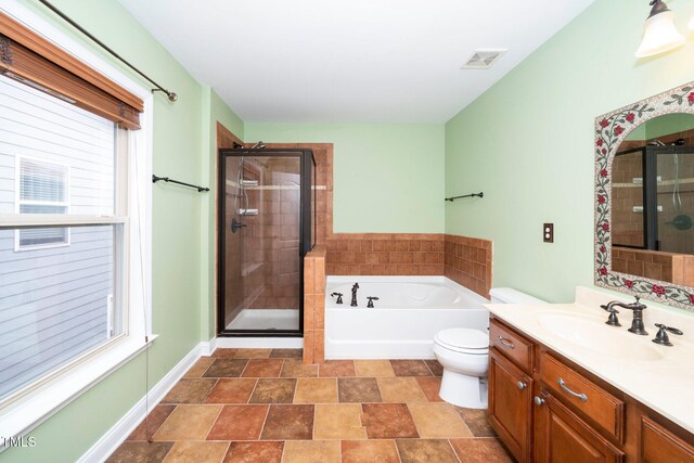 532 Front Ridge Dr, Cary, NC 27519 - full bathroom with a garden tub, vanity, a stall shower, and toilet