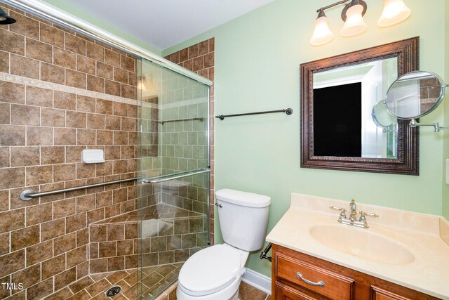 532 Front Ridge Dr, Cary, NC 27519 - full bath with toilet, vanity, a stall shower, and baseboards