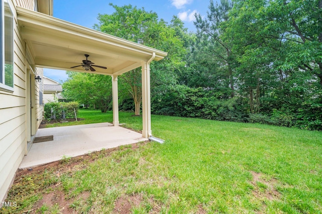 532 Front Ridge Dr, Cary, NC 27519 - view of green lawn with ceiling fan and a patio area